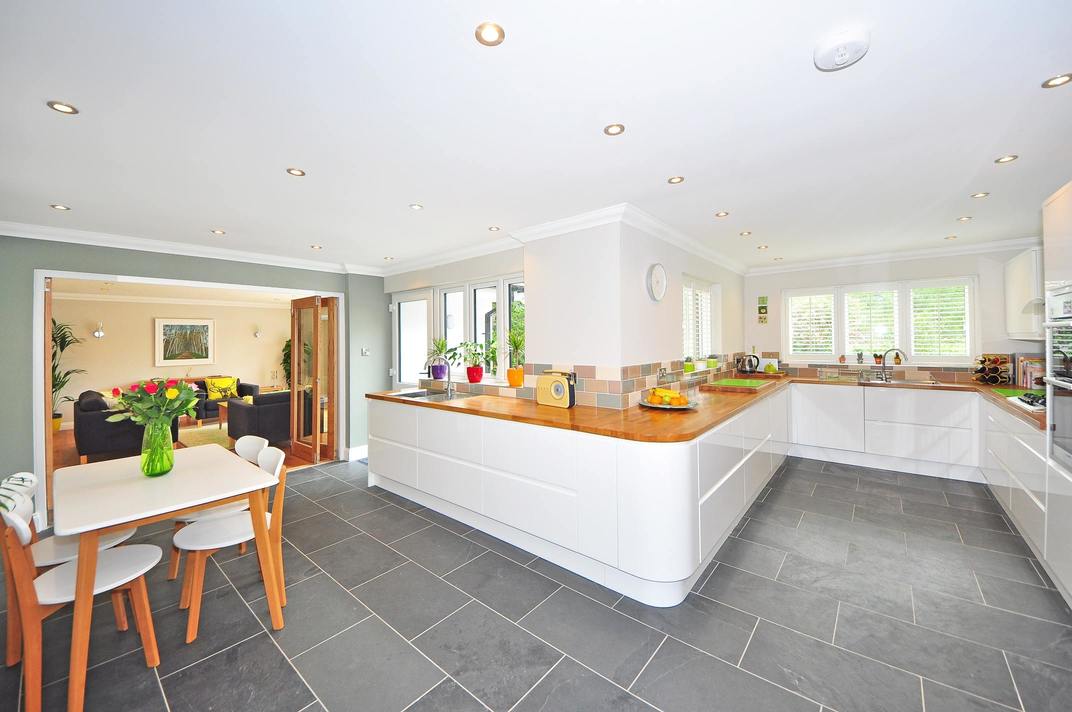 An image of a large kitchen on the ground floor of a home which has been extended.