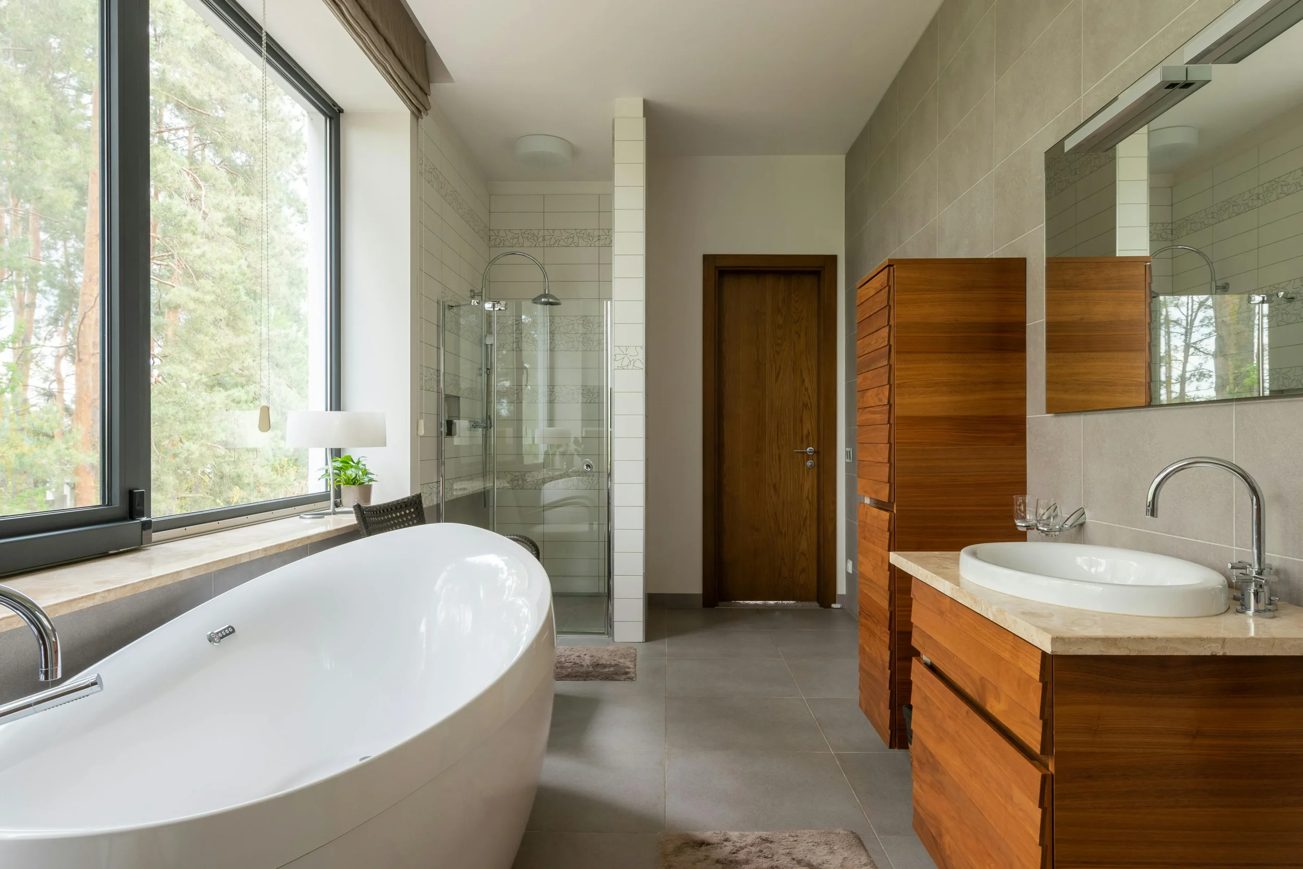 spacious bathroom with wooden furniture